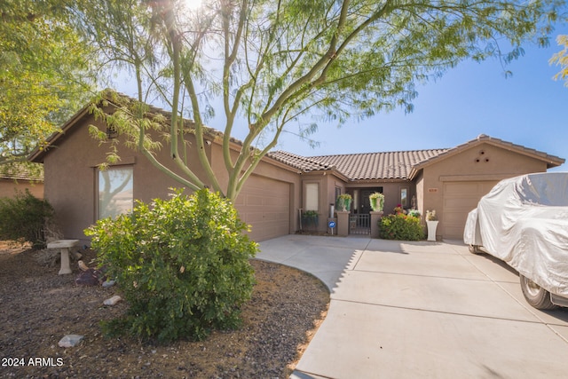 view of front of home with a garage