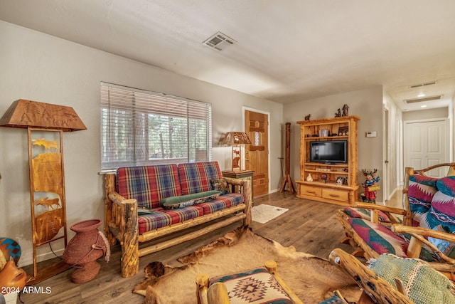 living room with wood-type flooring