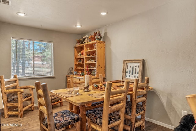 dining space featuring light hardwood / wood-style flooring