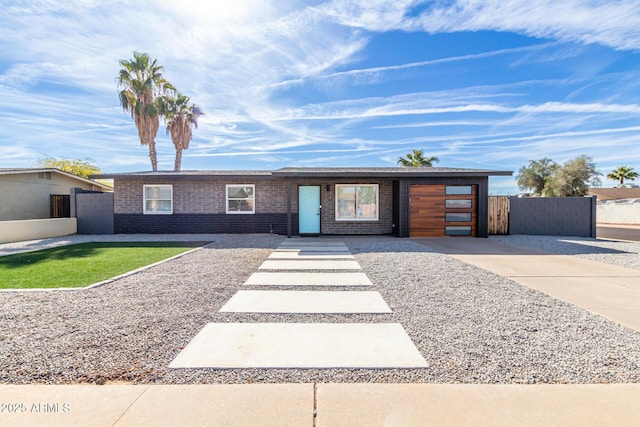 single story home with a garage