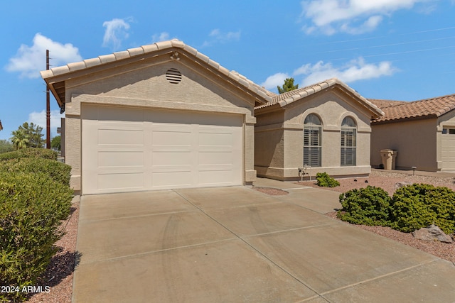 view of front of home with a garage