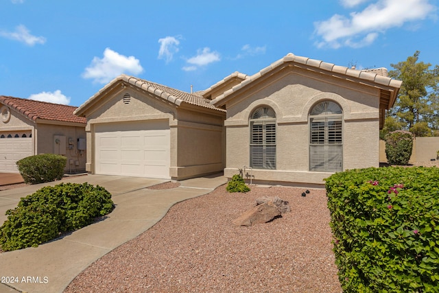 view of front of home with a garage