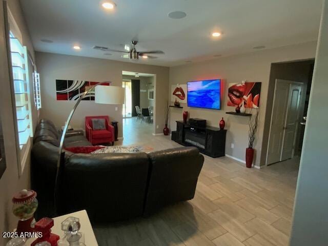 8587 N 171st Dr, Waddell, AZ 85355 - living area with a ceiling fan, light wood-type flooring, and recessed lighting