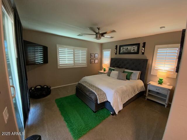 8587 N 171st Dr, Waddell, AZ 85355 - bedroom featuring carpet flooring and a ceiling fan