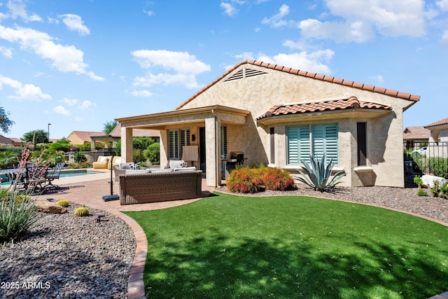 rear view of property featuring a fenced in pool, a patio, stucco siding, an outdoor hangout area, and fence