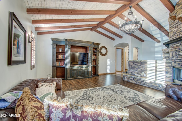 living room with vaulted ceiling with beams, hardwood / wood-style flooring, and an inviting chandelier