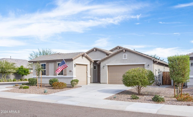 ranch-style home featuring a garage