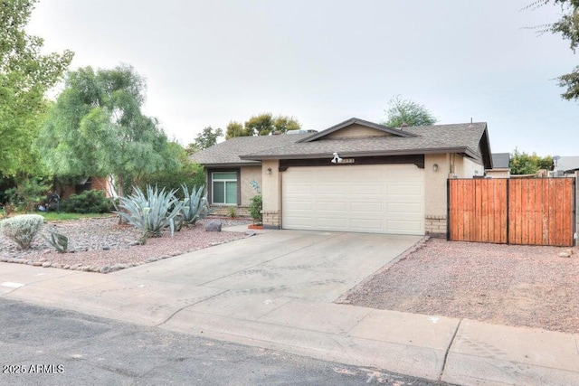 single story home featuring a garage