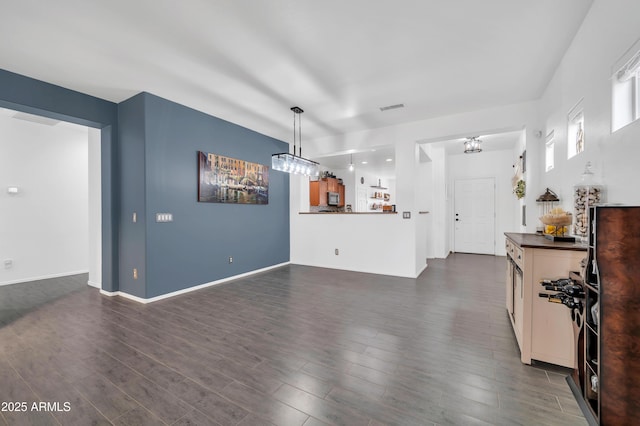 living room featuring dark hardwood / wood-style flooring