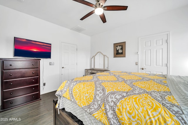 bedroom featuring dark wood-type flooring and ceiling fan