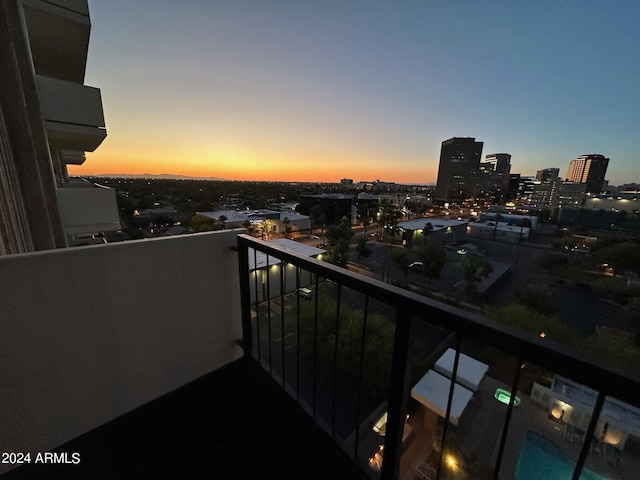 view of balcony at dusk