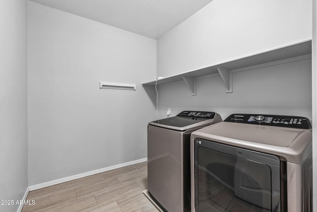 washroom featuring independent washer and dryer