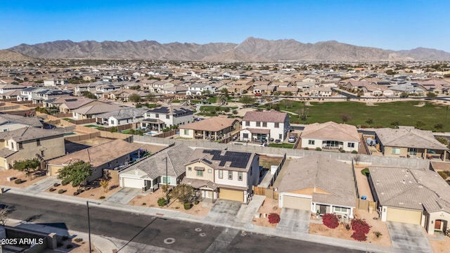 birds eye view of property featuring a mountain view