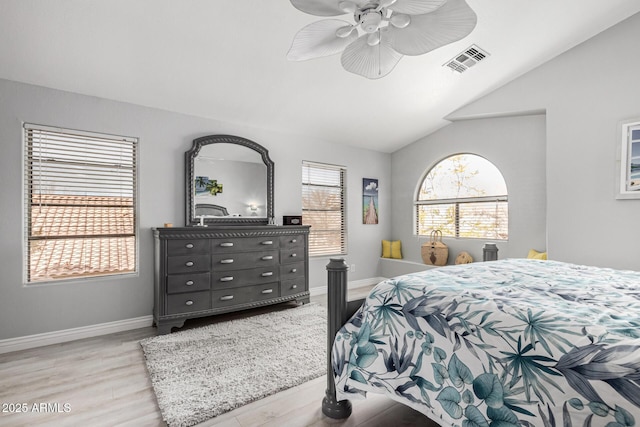 337 E Clairidge Dr, San Tan Valley, AZ 85143 - bedroom with light wood-type flooring, baseboards, visible vents, and vaulted ceiling