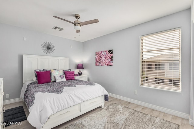 337 E Clairidge Dr, San Tan Valley, AZ 85143 - bedroom featuring light wood-style floors, baseboards, visible vents, and ceiling fan