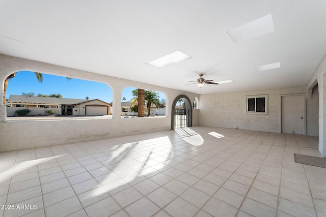 view of patio featuring ceiling fan