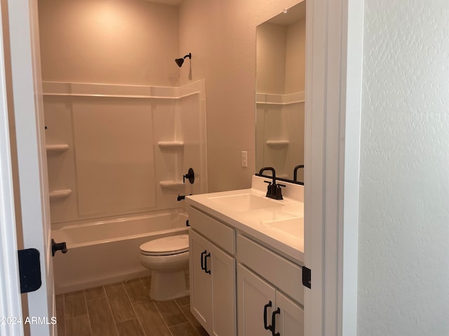 full bathroom featuring shower / bathing tub combination, vanity, and toilet