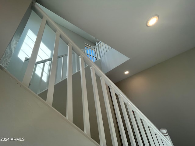 staircase featuring a wealth of natural light