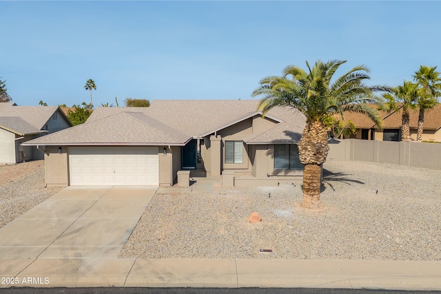 ranch-style house featuring a garage