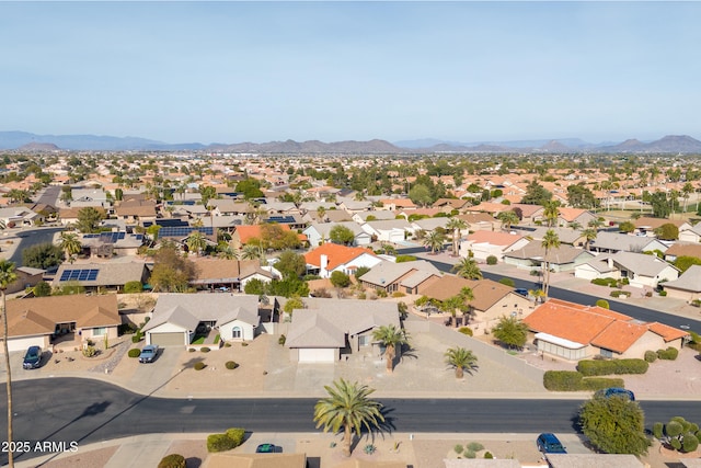 drone / aerial view featuring a mountain view