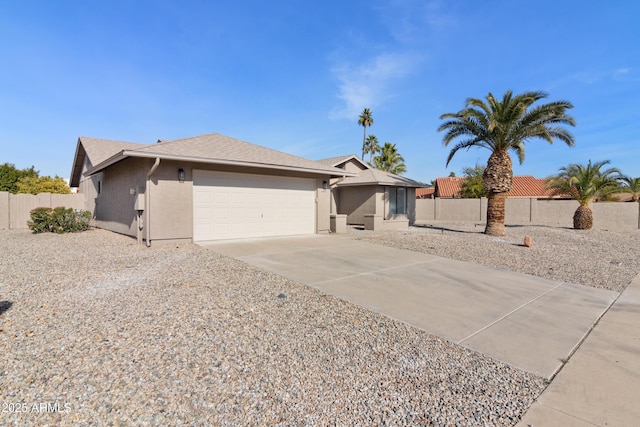 single story home featuring a garage