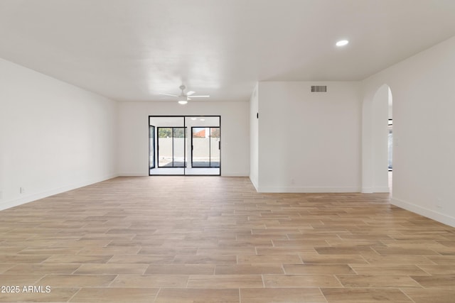 spare room with ceiling fan