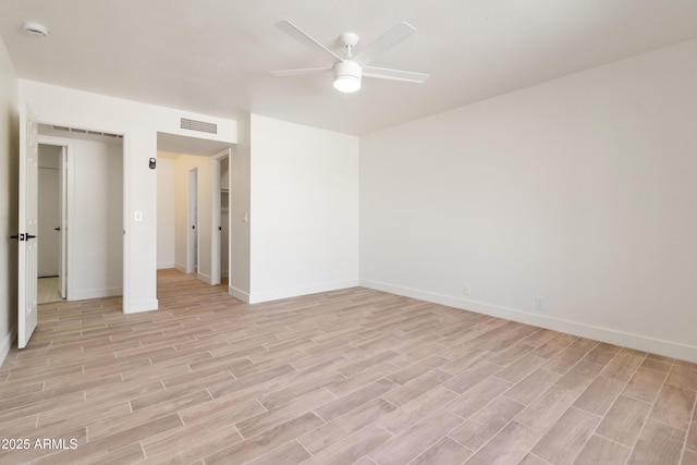 unfurnished room featuring ceiling fan