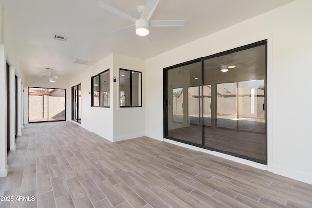 view of patio / terrace featuring ceiling fan