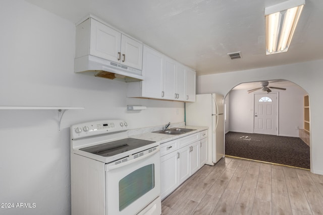 kitchen featuring ceiling fan, sink, white appliances, white cabinets, and light wood-type flooring