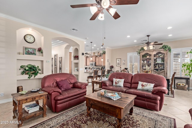 living room featuring recessed lighting, visible vents, ornamental molding, and light tile patterned flooring