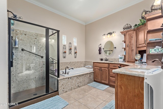 bathroom with ornamental molding, a garden tub, a sink, and a shower stall