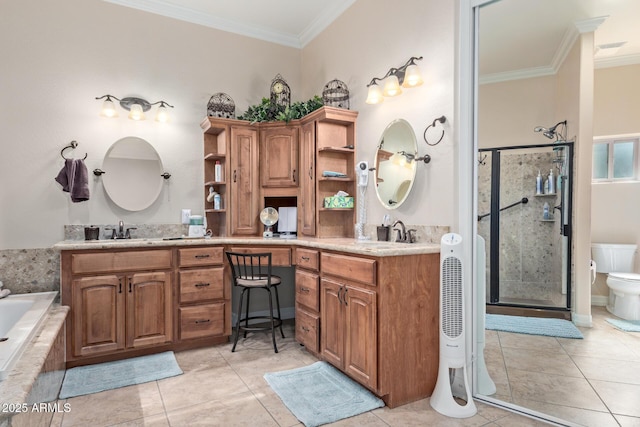 full bath featuring double vanity, a stall shower, ornamental molding, and a sink