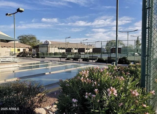 view of pool with fence