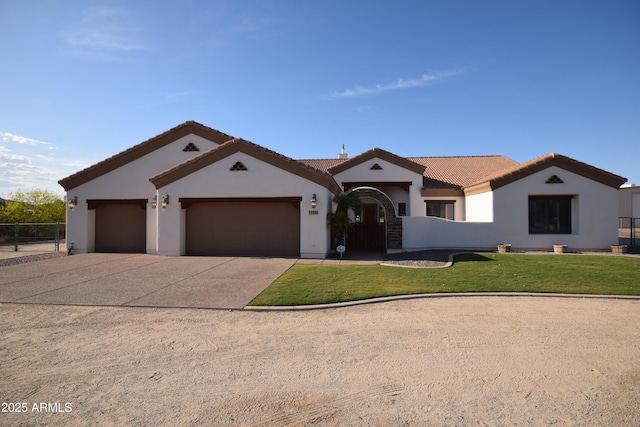 19880 W Desert Views Dr, Casa Grande, AZ 85122 - view of front of home with a garage, a tile roof, stucco siding, and driveway