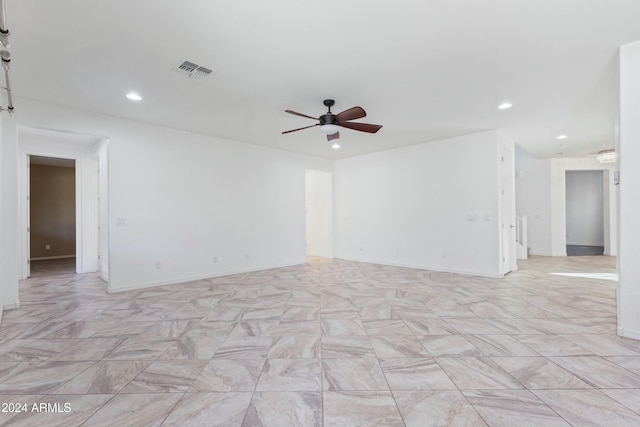 unfurnished room featuring ceiling fan