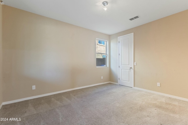 view of carpeted spare room