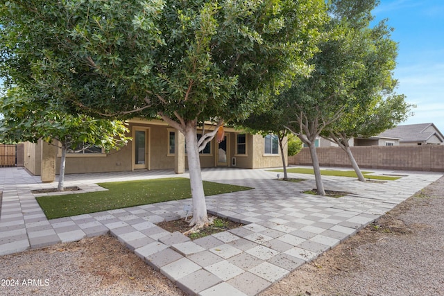 view of front of home with a patio