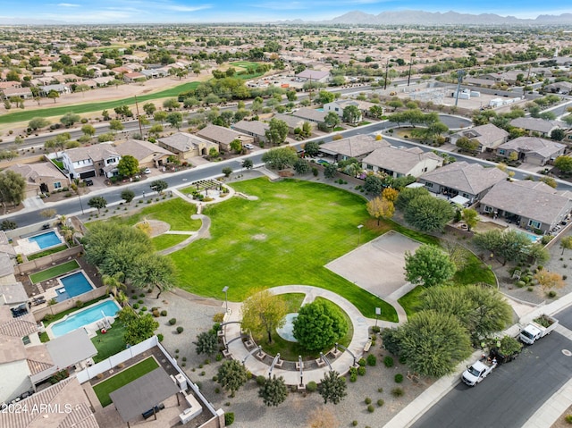 birds eye view of property with a mountain view