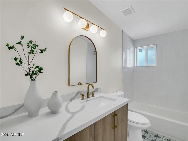 full bathroom with  shower combination, visible vents, vanity, and toilet