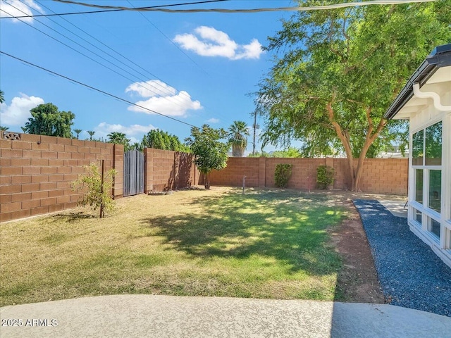 view of yard featuring a fenced backyard