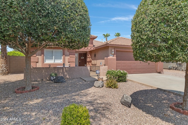 view of front of property featuring a garage