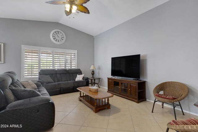 tiled living room featuring high vaulted ceiling and ceiling fan