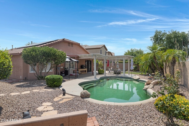 view of pool featuring a patio and a pergola