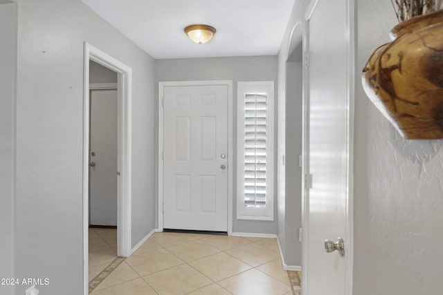 foyer with light tile patterned floors