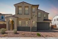 mediterranean / spanish house featuring an attached garage