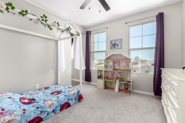 bedroom featuring baseboards, carpet, and a ceiling fan