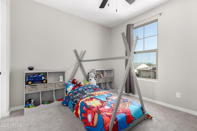 bedroom featuring ceiling fan, baseboards, and carpet floors