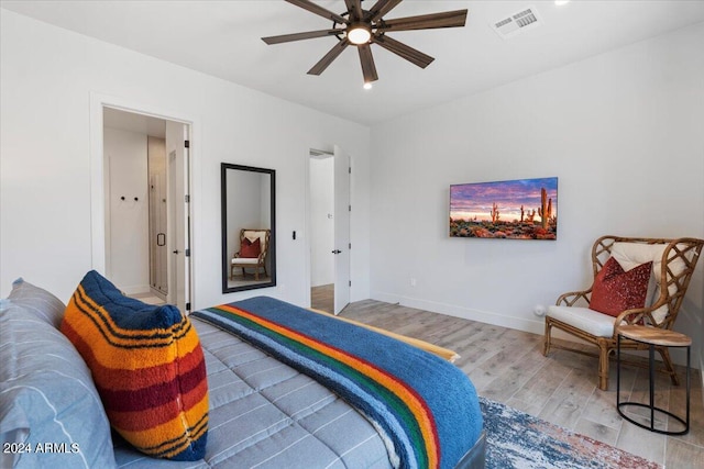 bedroom featuring ceiling fan and hardwood / wood-style flooring