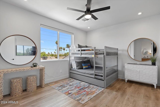 bedroom featuring hardwood / wood-style floors and ceiling fan