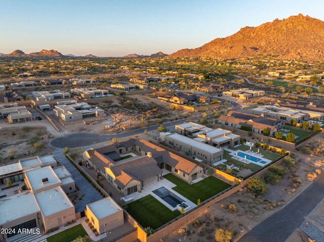 aerial view at dusk with a mountain view